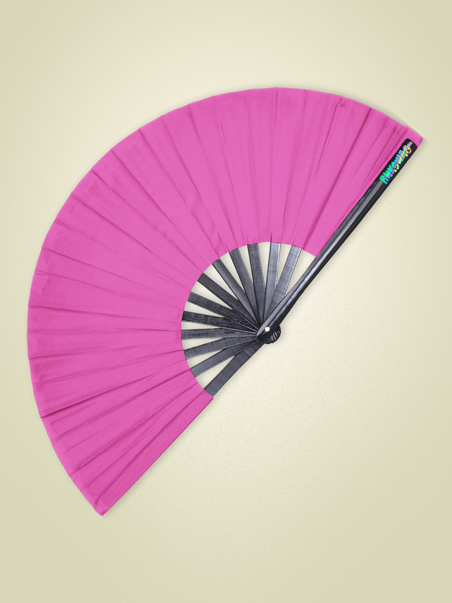 Pink folding fan with black handle on a beige background