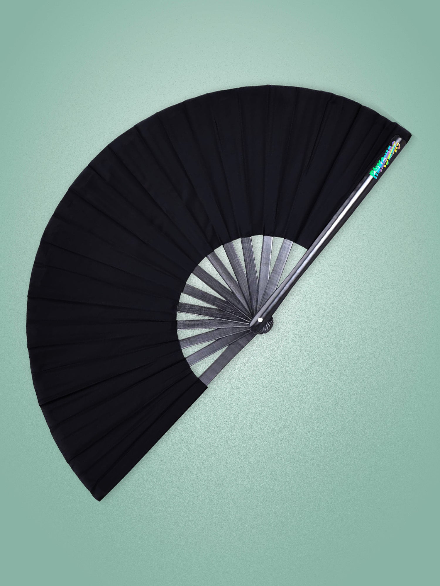 Black fan on a light green background