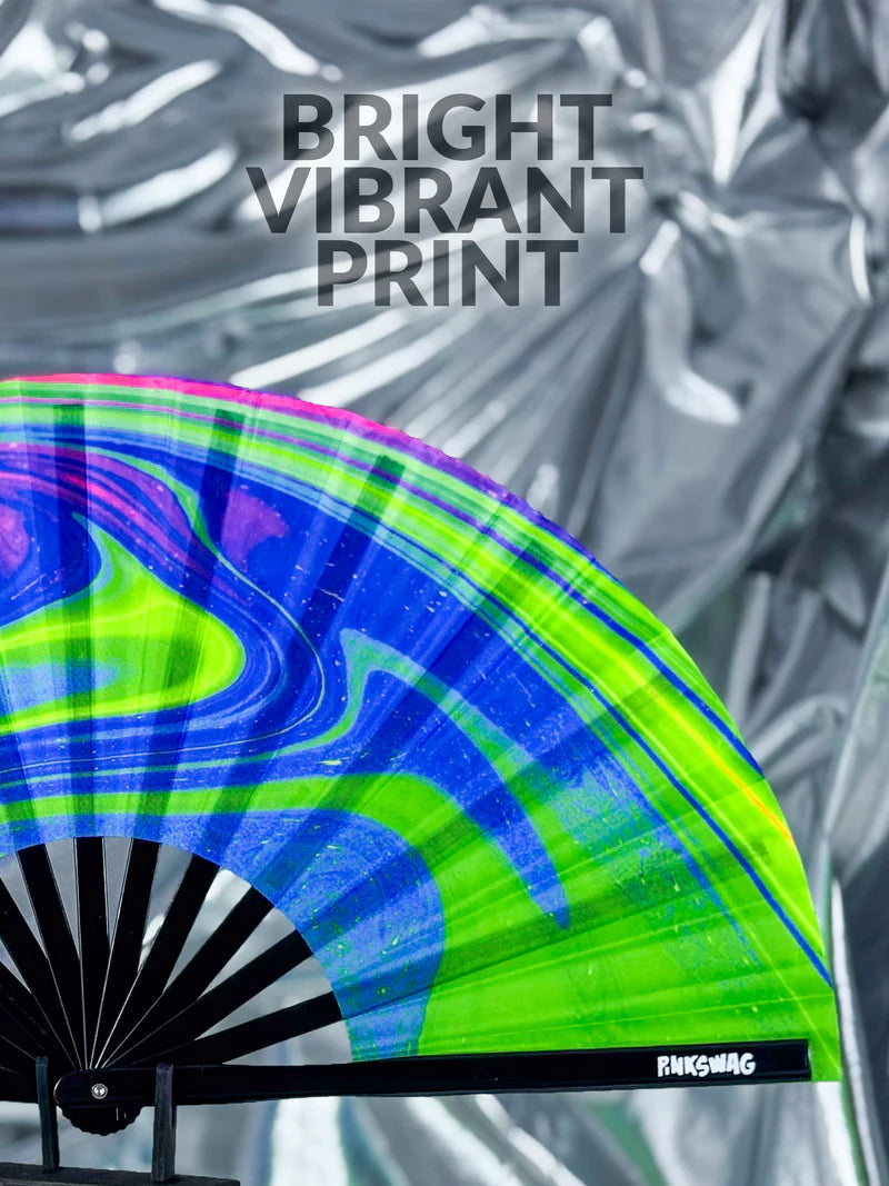 Colorful fan with a vibrant print against a metallic background