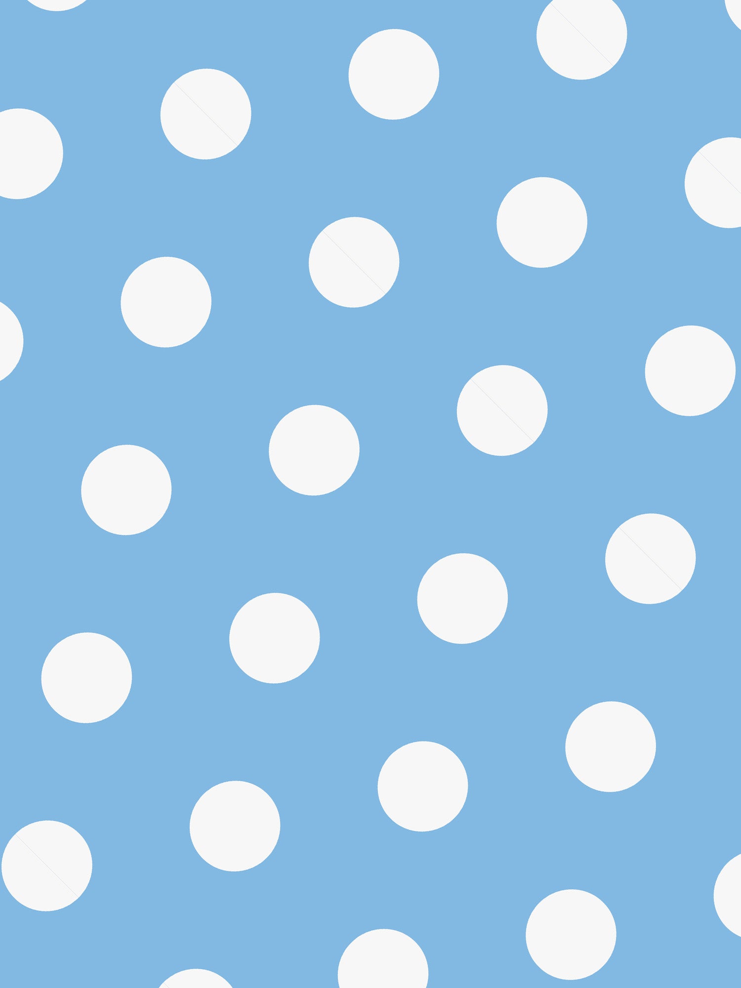 White polka dots on a blue background