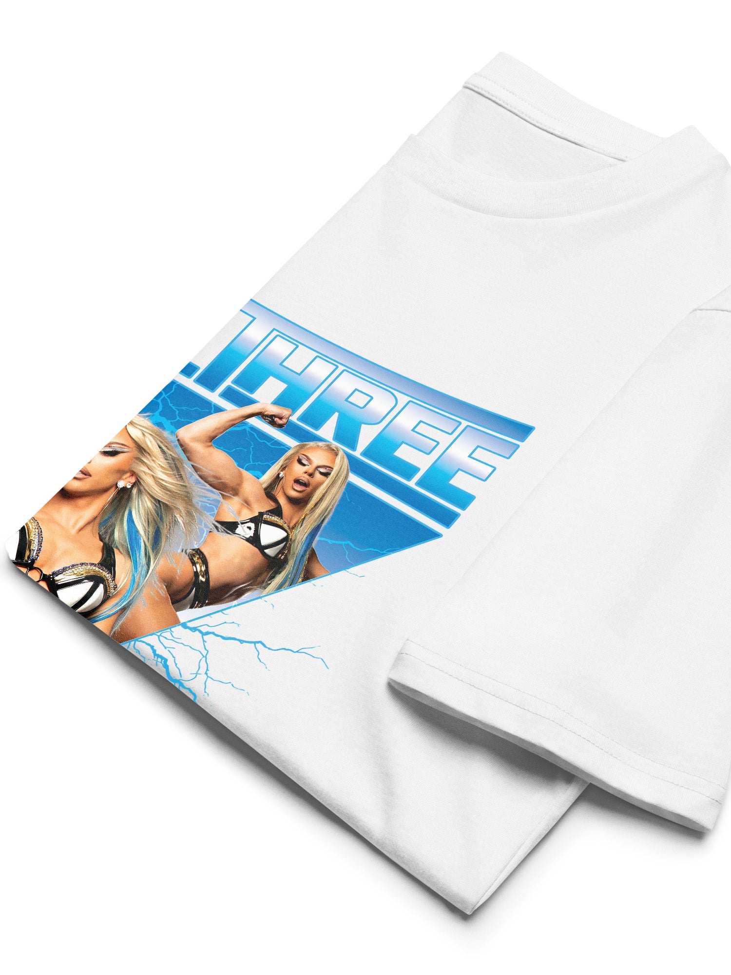 White t-shirt with a graphic of a woman in a bikini and the text 'WWE' on a white background. Paige Three from BBC RuPaul's Drag Race UK Season 7